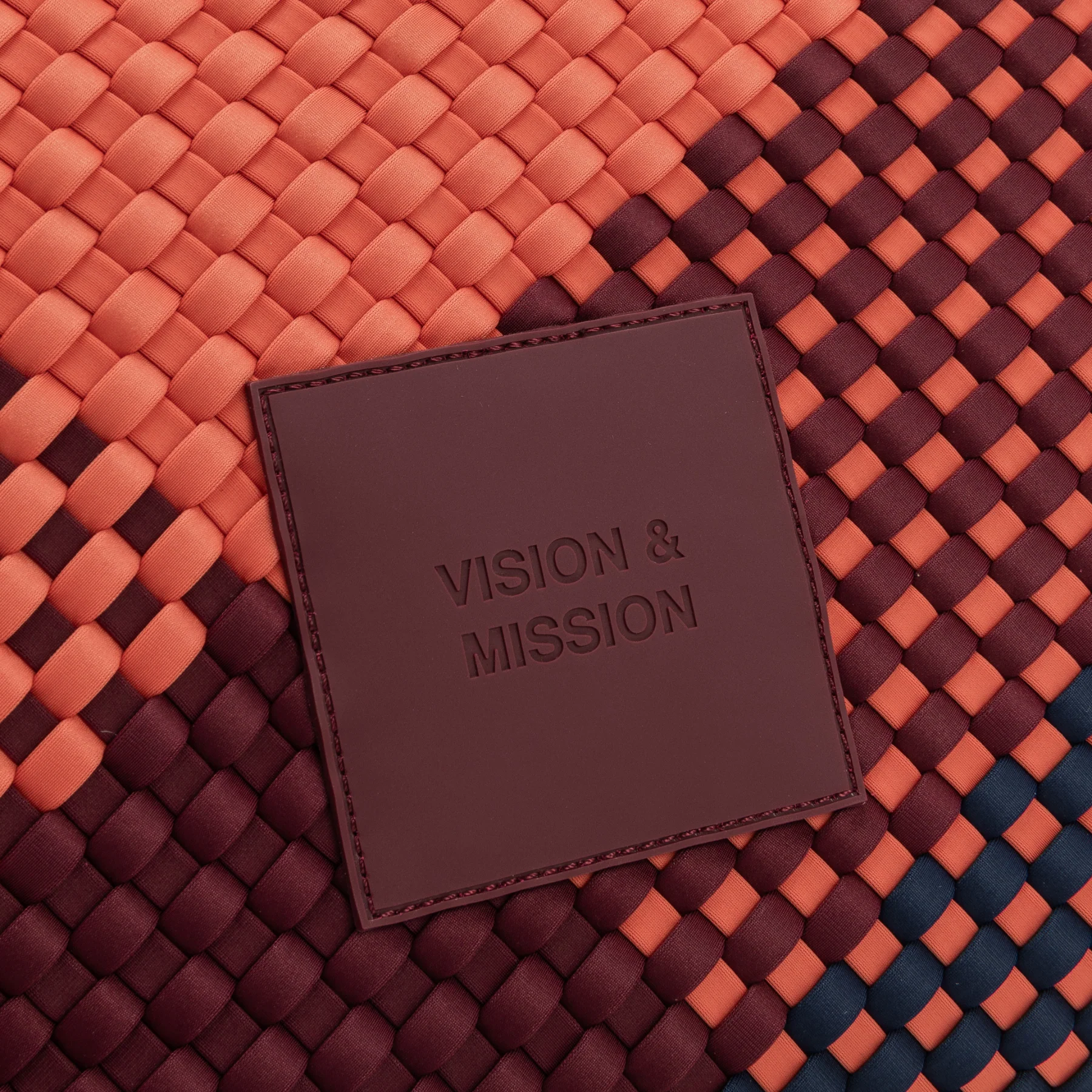bolso vision and mission naranja de verb to do – neopreno trenzado